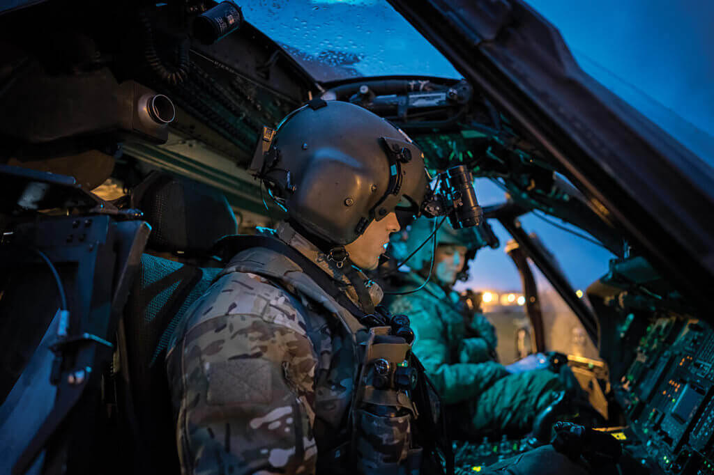 56th Rescue Squadron pilots go through their pre-flight checklist prior to a night sortie at their home base, RAF Lakenheath.