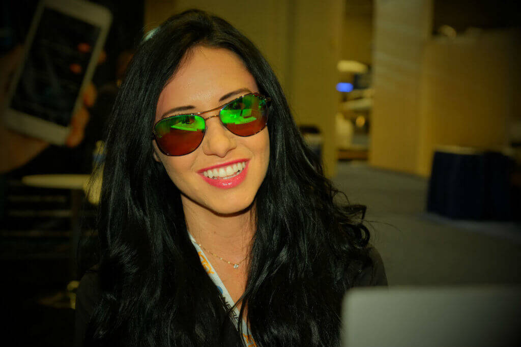 Tracy Maloney, sales coordinator for ST Laserstrike, models glasses that block out the majority of light from green and blue lasers, as well as infrared and ultraviolet light. Ben Forrest Photo