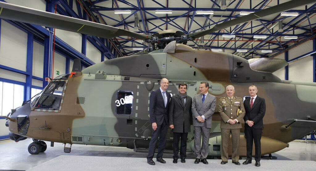 Assembled at the Airbus Helicopters Spanish final assembly line in Albacete, Spain, the NH90 will be operated by the Spanish Army's aviation branch, Fuerzas Aeromóviles del Ejército de Tierra. Pictured here, representatives celebrate the recent delivery. NHIndustries Photo
