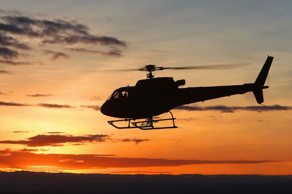An H125 in silhouette