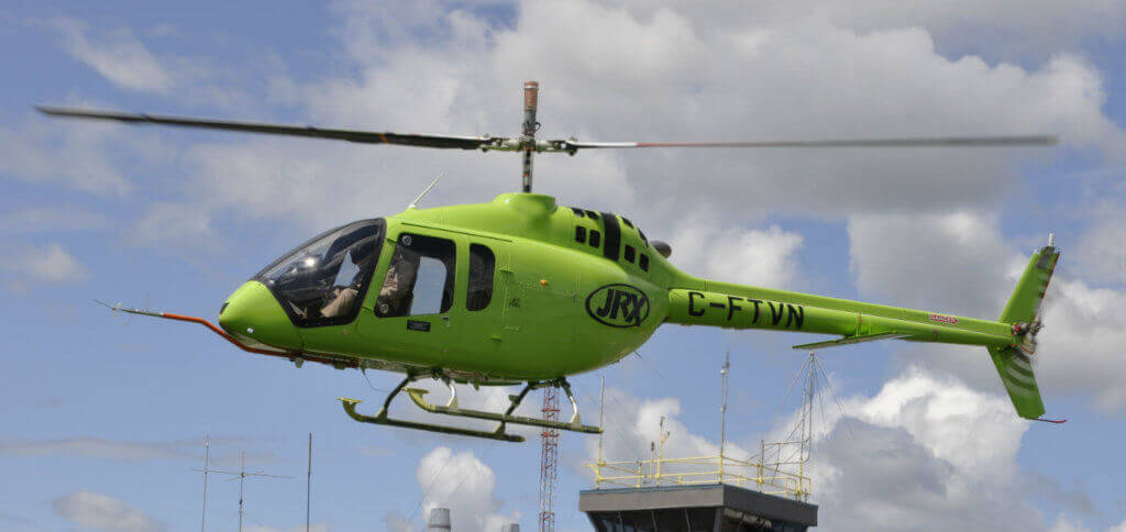 Bell Helicopter unveiled the first completed model of the 505 Jet Ranger X at its Mirabel, Quebec, factory on Feb. 9, 2017. Here, the new helicopter is seen undergoing testing outside the Mirabel plant. Kenneth I. Swartz Photo
