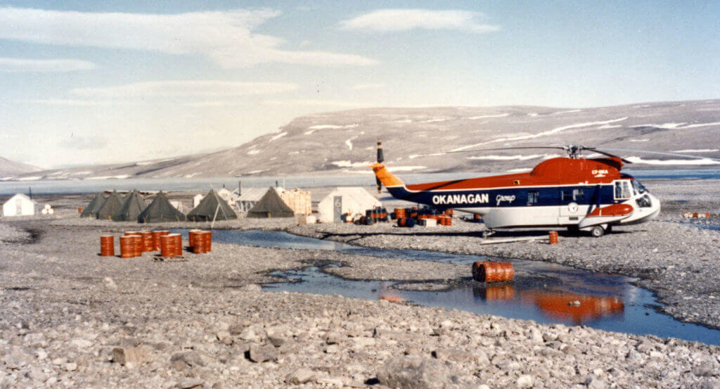 This Sikorsky S-62A, CF-OKA, was one of the first turbine helicopters purchased by Okanagan Helicopters. Here we see it at a government camp project on Devon Island in Canada's Far North in 1961. Department of National Defence Photo