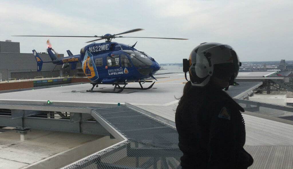 A Johns Hopkins Lifeline helicopter arrives to pick up and transport Ferdinand Hui from Baltimore, Maryland, to Washington, D.C. Johns Hopkins Medicine Photo
