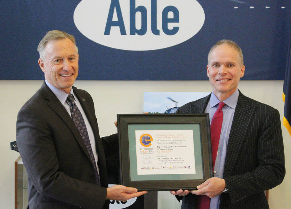 City of Mesa Mayor John Giles (left) honored Able during a certificate presentation, held at Able's 200,000-square-foot headquarters at the Phoenix Mesa Gateway Airport in Mesa, Arizona. Able Photo