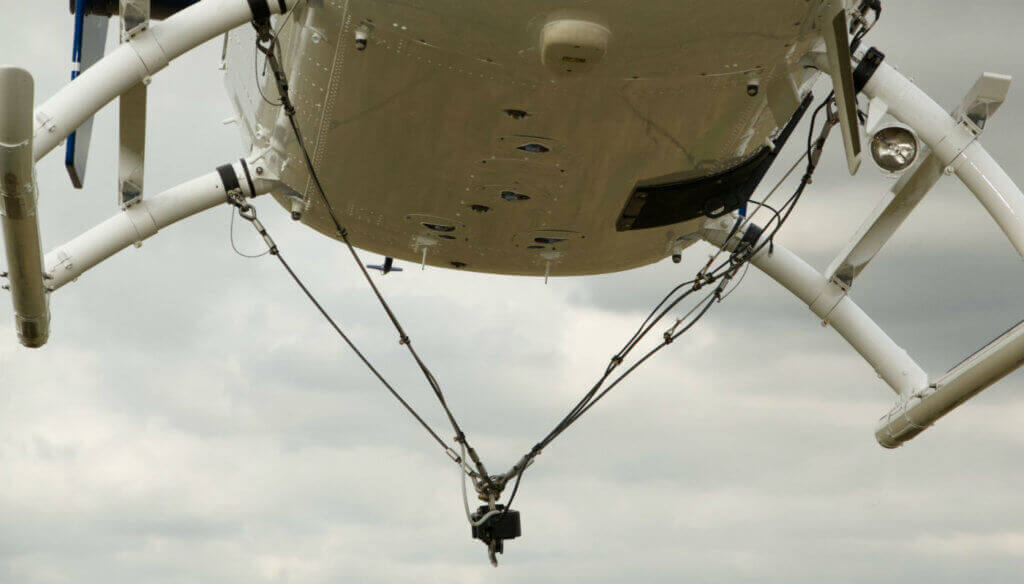 The BK117 cargo hook has a carrying capacity of up to 1, 200 kilograms. It utilizes the Onboard Systems cargo hook with the option of either hydraulic or manual release and can be mounted to either an Airwork-manufactured or original equipment manufacturer cargo sling. Airwork Photo