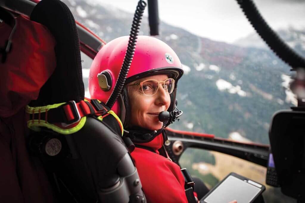 Whether in the air or on the slopes, you simply can't overlook Juen's bright pink helmet.