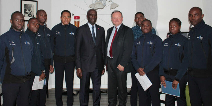 The Cameroonian Armed Forces pilots take a photo with HUTC CEO and chairman Patrick Molis, during the diploma ceremony. HUTC Photo