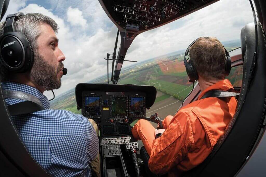 Vertical's Jon Duke (left) during his flight evaluation of the Airbus H135 with Helionix in Donauwörth, Germany. Lloyd Horgan Photo