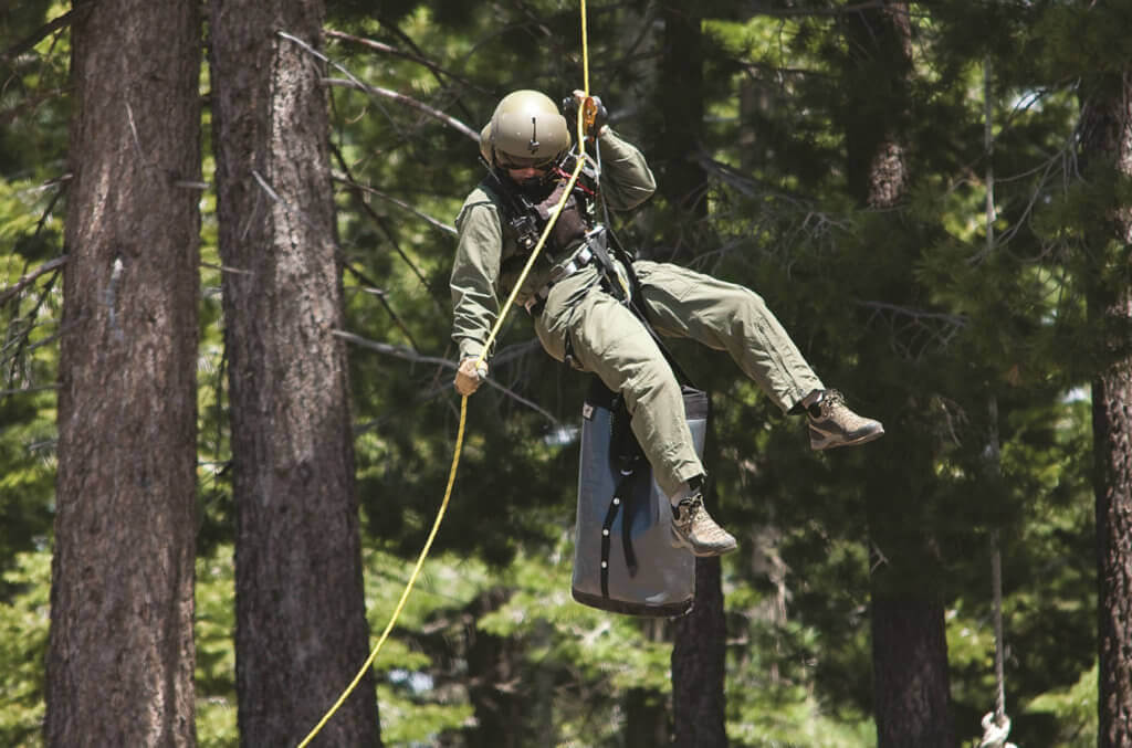 Rappel techniques are used to deliver rescuers into big trees, including the park's 200-foot redwoods