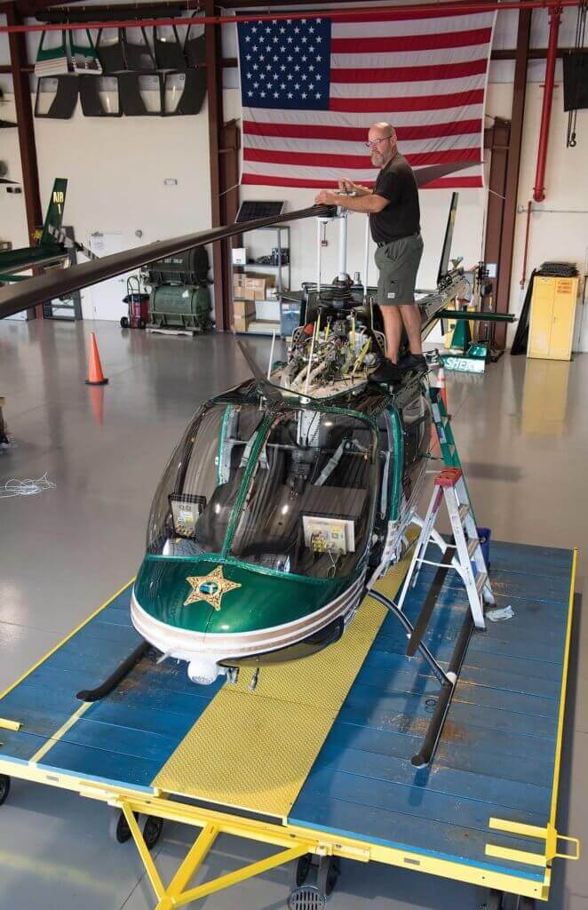 Floor and wall space in the MCSO hangar is utilized in such a way to maximize Eric Ellington's maintenance needs as well as parts and aircraft housing/storage.