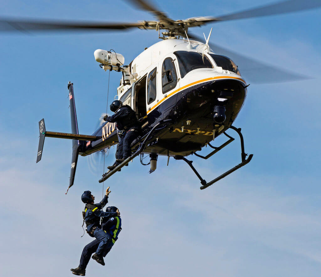 A Bell 429, operated by the NYPD, performs a hoist training mission. Able Aerospace Services now offers repair and overhaul services for the type. Able Aerospace Services Photo