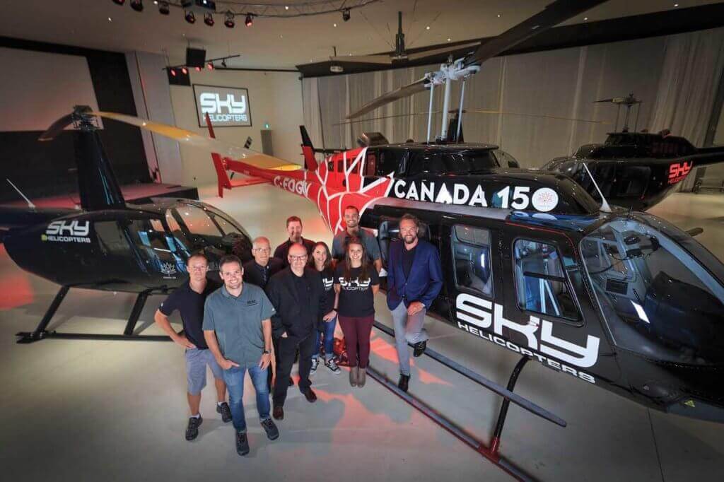 Andrew Westlund (far right) established Sky Helicopters six years ago to help transport leaders to and from downtown Vancouver. Today, the company has 10 employees and a fleet of six helicopters. Heath Moffatt Photo
