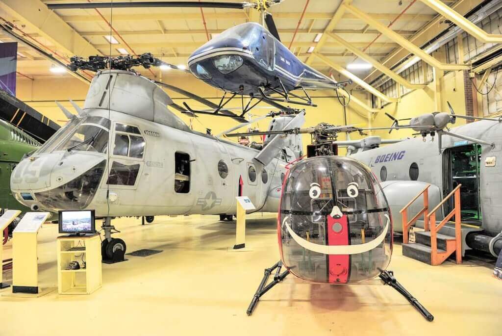Another classic tandem at the museum in the U.S. Marine Corps.' Boeing Vertol CH-46E "Phrog." Hanging from the roof is an Enstrom F-28. Skip Robinson