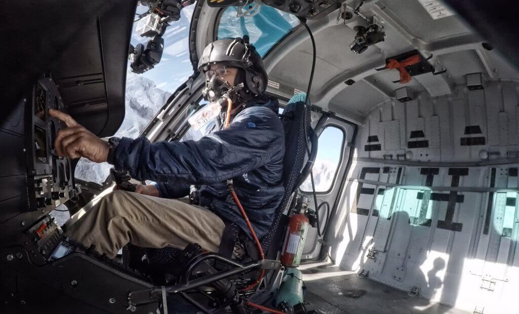High-altitude flights require pilots to use supplemental oxygen. Here, pilot Ryan Skorecki is seen en route to Everest Camp 2, elevation 21,000 feet (6,400 meters). Photo courtesy of Ryan Skorecki