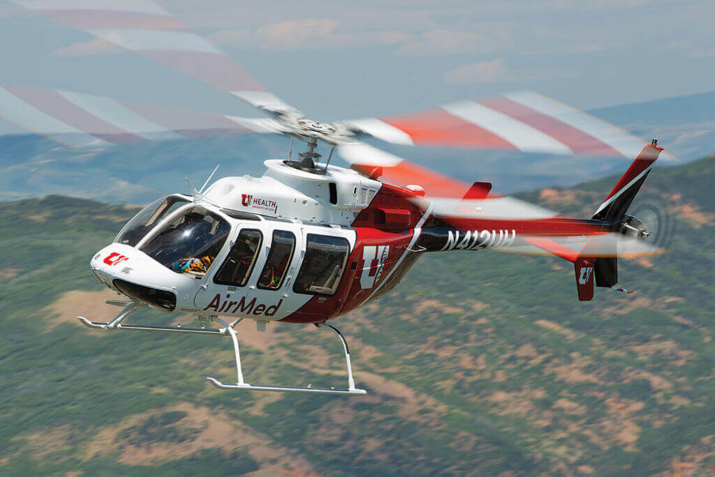 The Bell 407 is well suited to the challenges faced daily by AirMed crews, providing performance and versatility to work in high and hot environments, and into/from confined areas. Dan Megna Photo