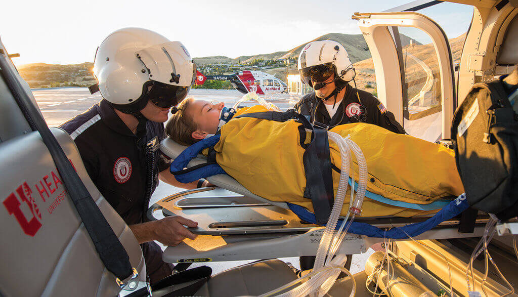 Flight paramedic Bryson Westbrook and flight nurse Brian Simpson unloading a patient at the UUHC rooftop helipad. Dan Megna Photo
