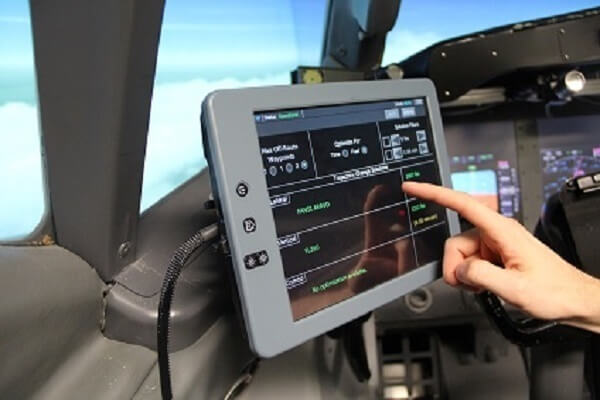 An EFB is an electronic information management device that helps flight crews perform flight management tasks more easily and efficiently with less paper. FAA Photo