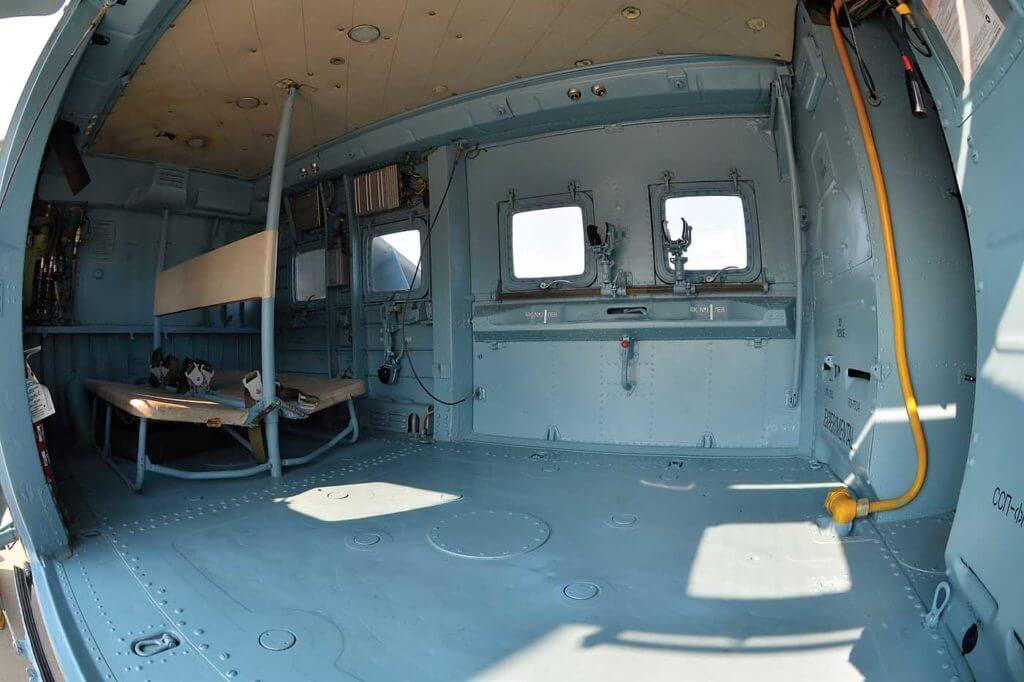 In the cabin, six window/gun ports allow small arms to be fired from swivel mounts, which are elevation- and azimuth-limited due to the presence of the main rotor and wings. Skip Robinson Photo