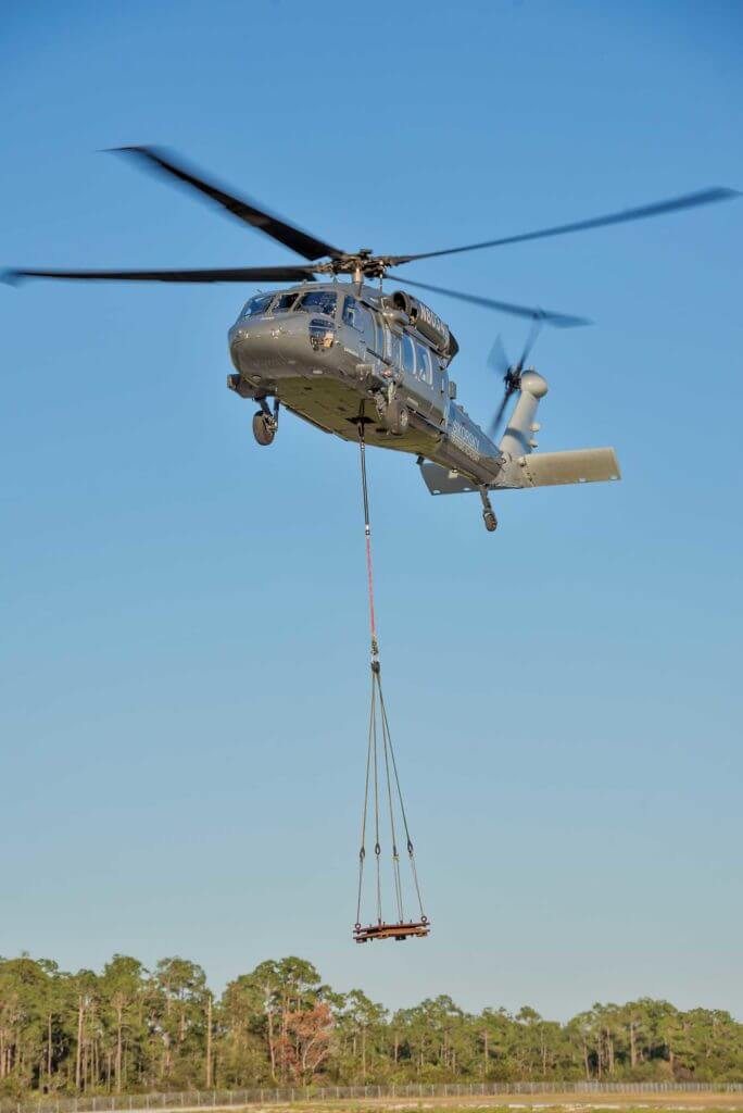 The S-70i retains the A model's 9,000-pound capacity cargo hook, but improves hover-out-of-ground-effect performance over the A by 850 pounds at 6,000 feet pressure altitude and 30 C (86 F). Sikorsky Photo 