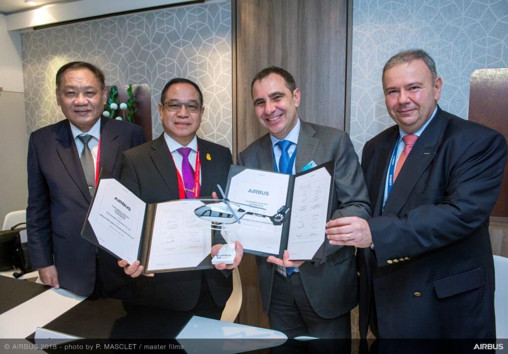 Thai Aviation Industries and Airbus Helicopters executives celebrate the agreement which will heighten the technical competency of helicopter maintenance in Thailand. Philippe Masclet Photo