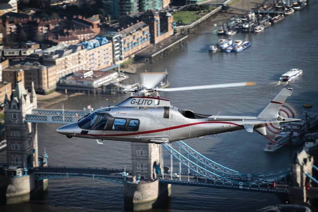 One of Castle Air's A109S Grand models flies past the iconic Tower Bridge in London. Lloyd Horgan Photo