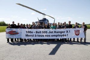 Mirabel facility employees gather around the aircraft to commemorate the milestone. Bell Photo