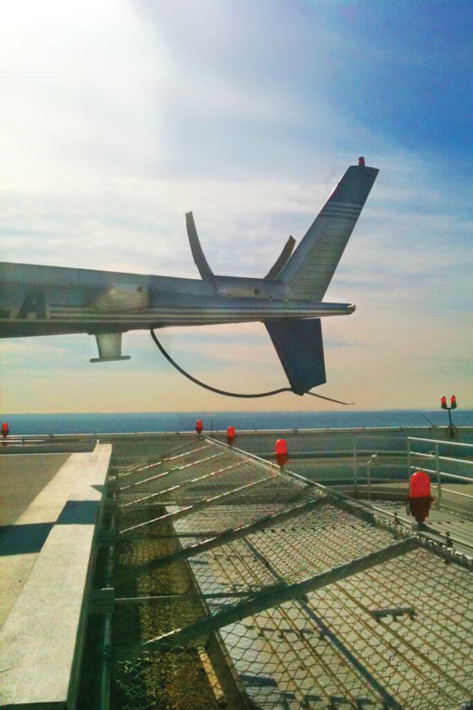 During their recon of the AON rooftop helipad, the authors realized that the elevated netting and lights posed the risk of a tail strike if pilots came in too fast. Photo courtesy of Jack Schonely. 