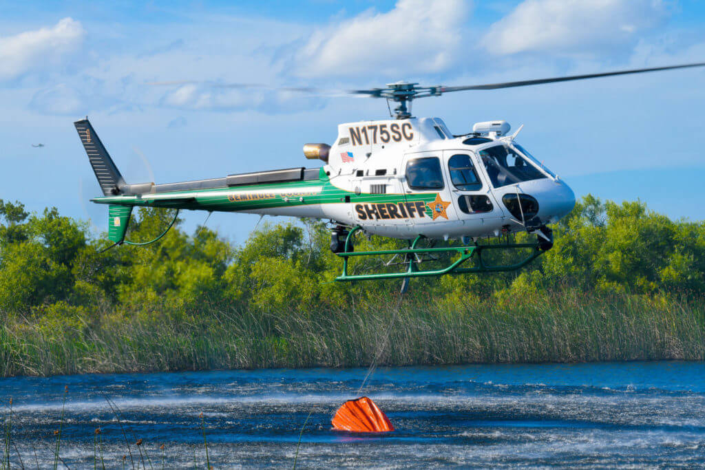 The Aviation Section's new H125 has a cargo hook equipped to sling a 210-gallon Bambi Bucket, which it uses to control brush fires around the county in hot and dry conditions. Mike Reyno Photo
