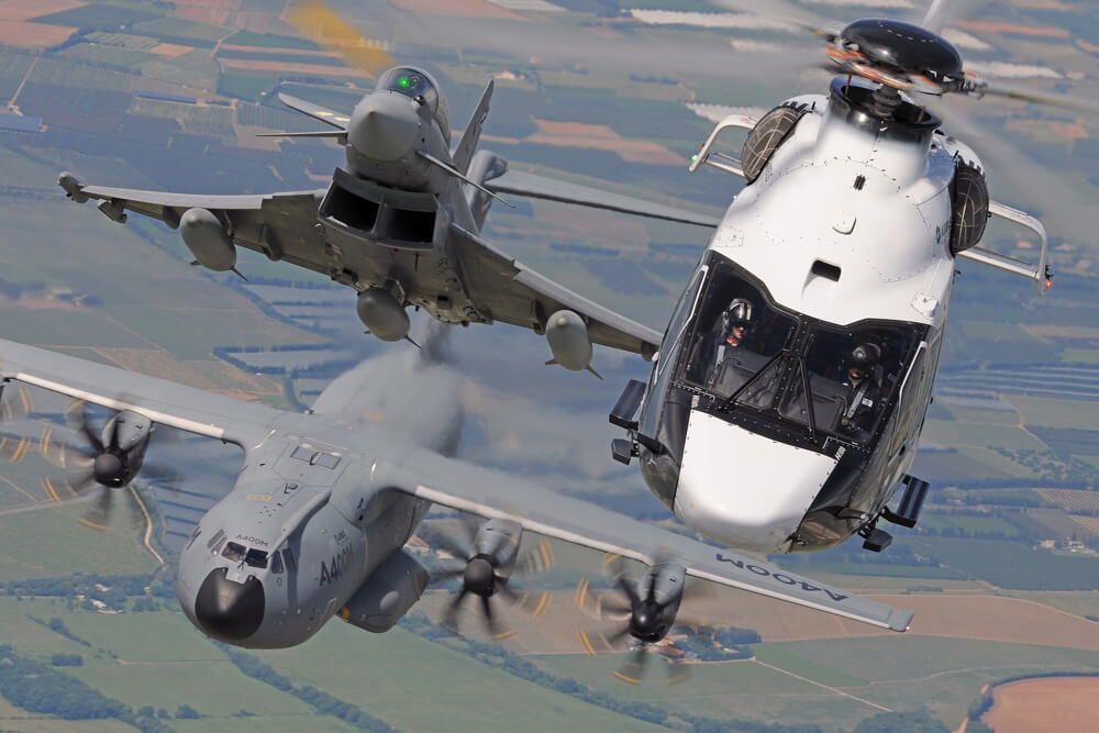 Airbus Helicopters H160, Eurofighter Typhoon, and Airbus A400M in formation