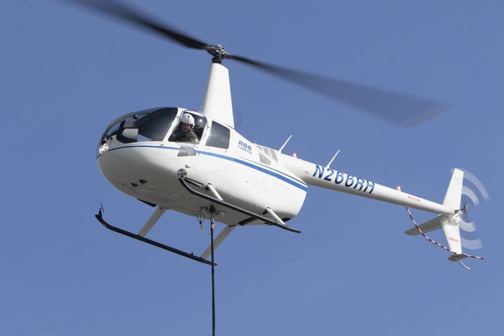 The cargo hook increases the R66's maximum gross weight from 2,700 lb to 2,900 lb. Robinson Photo