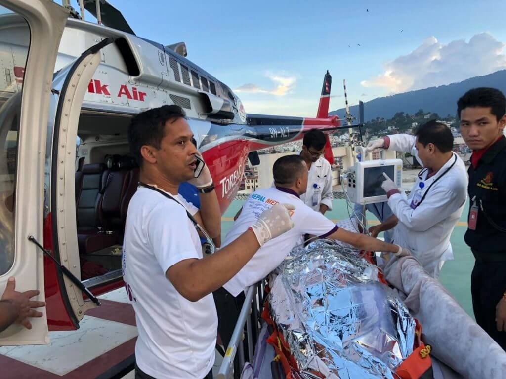 Two Mediciti doctors were situated at the hospital's helipad to provide further care to the patient before she was moved into the emergency department. Nepal Mediciti Hospital Photo