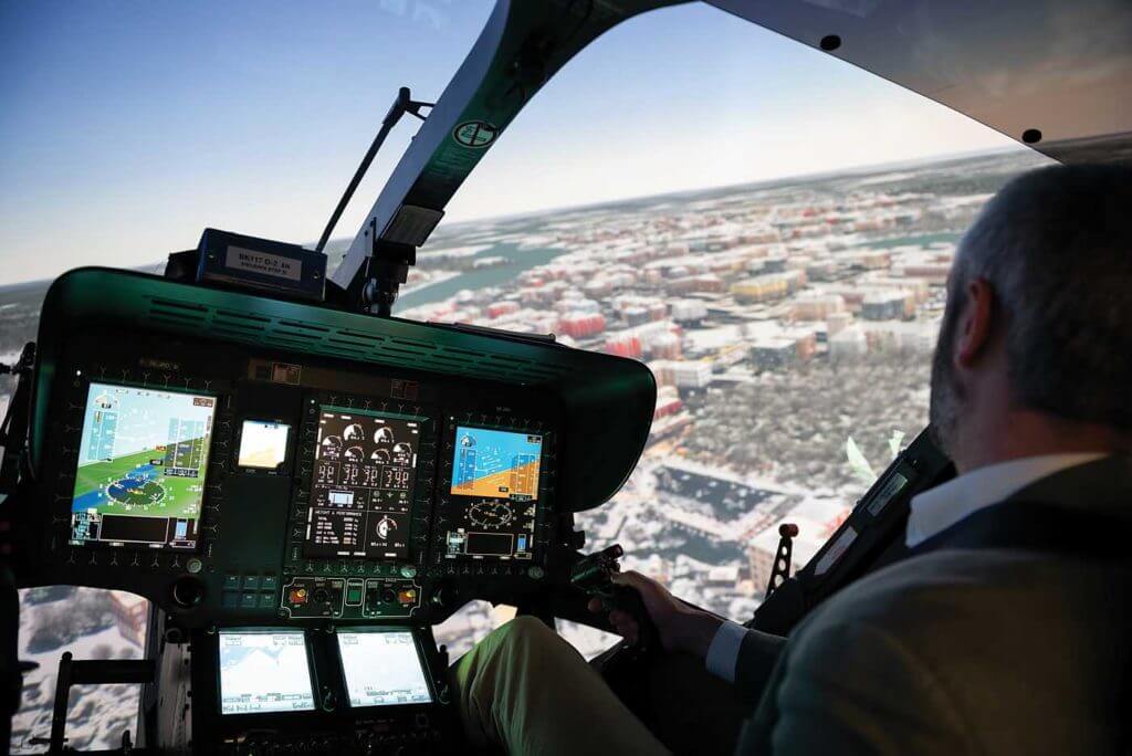 The author in Coptersafety's H145 simulator, flying over Rovaniemi in northern Finland. Lloyd Horgan Photo