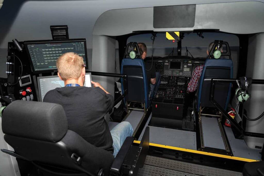 Typical of most simulators, an instructor station is positioned behind the cockpit module from which the crew's life can be made increasingly difficult as required. Lloyd Horgan Photo