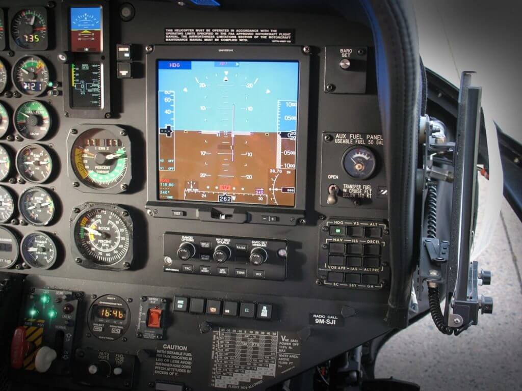 The avionics upgrade replaces legacy EFIS with three UA EFI-890H Advanced Flight Displays. Universal Avionics Photo