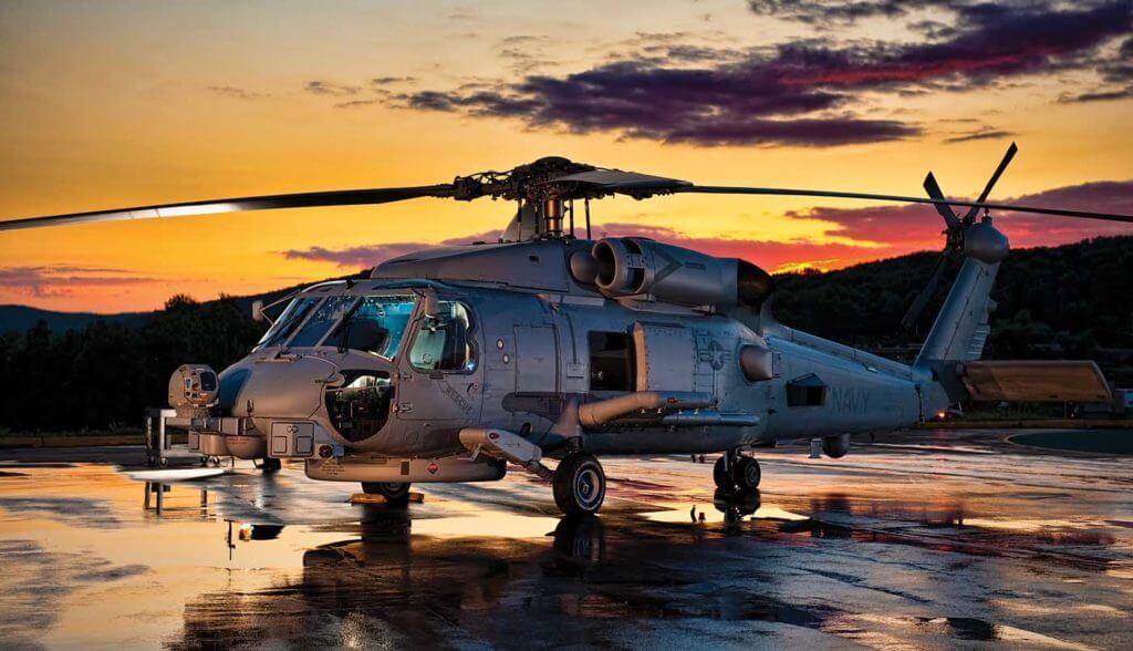 The MH-60R is the most capable ASW and anti-surface warfare helicopter in the world today, equipped with dipping sonar and sonobuoy processing capability. Daniel Rude Photo 