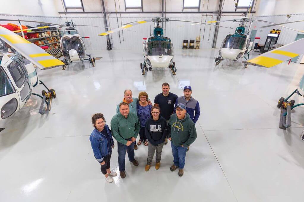 George and Debbie Kelham (back left) started Slave Lake Helicopters in January 1998. Almost 21 years later, the company has grown to a full-time staff of 10. Heath Moffatt Photo