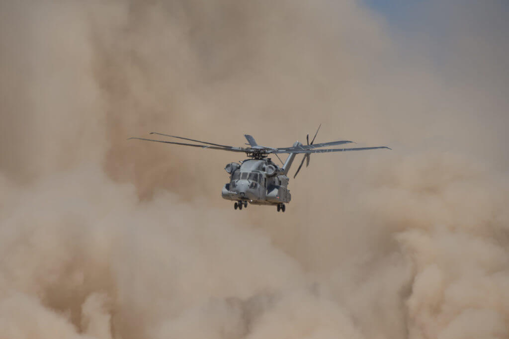 A CH-53K helicopter conducts flight testing in Yuma