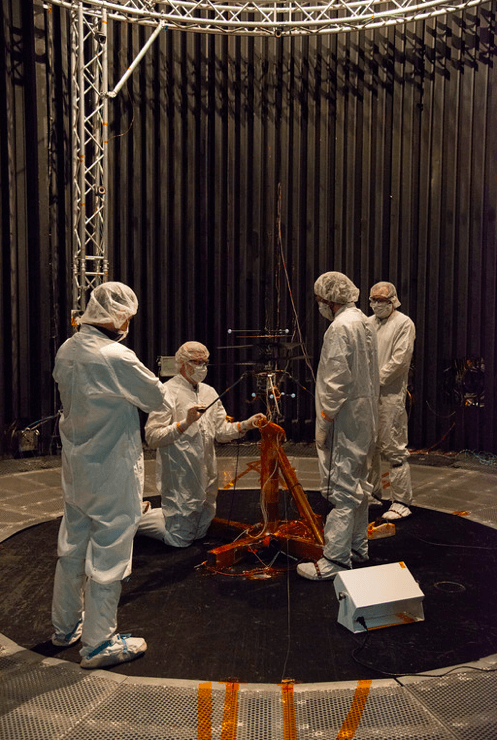 NASA engineers prepare the aircraft for a flight test in the space simulator at the Jet Propulsion Laboratory. The simulator can replicate many of the conditions found on Mars, such as its extremely thin atmosphere. NASA/JPL-Caltech Photo